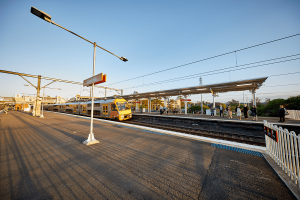 Train passing by Seven Hills Station Canopy