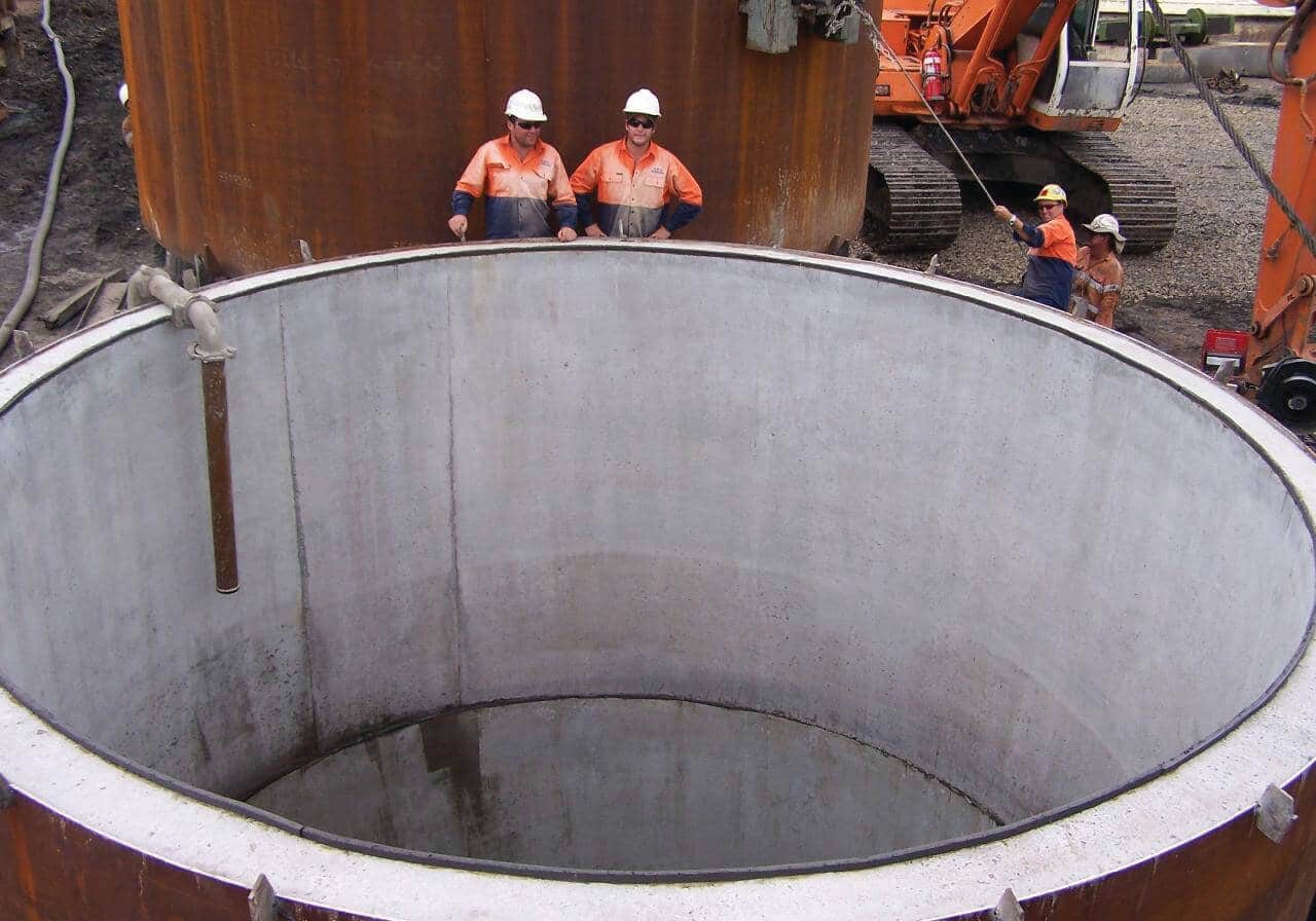 Two people standing by a liner